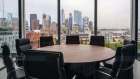 Buildings in the Manhattan skyline are seen from a meeting at the Dwight Capital LLC new office space inside 787 11th Avenue in New York, U.S., on Monday, July 30, 2018. The glitzy new offices at 787 11th Avenue in Hell's Kitchen for financial companies are a departure from the building's 1920s roots as a service hub for Packard Motor Car Co. Photographer: Johannes Berg/Bloomberg