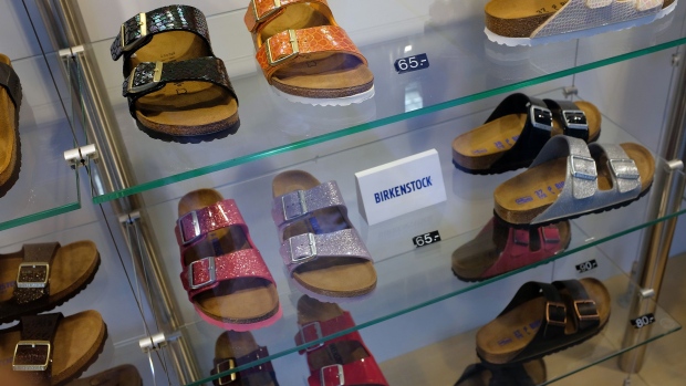 BERLIN, GERMANY - JANUARY 11: Sandles lie on display in the sindow of a Birkenstock store on January 11, 2018 in Berlin, Germany. Much of the German consumer goods and foodstuffs economy is dominated by nationwide chains. (Photo by Sean Gallup/Getty Images) Photographer: Sean Gallup/Getty Images Europe