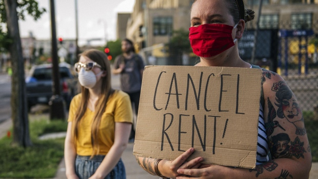 MINNEAPOLIS, MN - JUNE 30: Demonstrators listen during the Cancel Rent and Mortgages rally on June 30, 2020 in Minneapolis, Minnesota. The rally was organized to demand the temporary cancellation of rents and mortgages as COVID-19 continues to adversely effect the economy. (Photo by Brandon Bell/Getty Images) Photographer: Brandon Bell/Getty Images North America