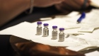 Vials of the Pfizer-BioNTech Covid-19 vaccine at Sanford Health Medical Center in Fargo, North Dakota, U.S., on Monday, Dec. 14, 2020. The first Covid-19 vaccine shots were administered by U.S. hospitals Monday, the initial step in a historic drive to immunize millions of people as deaths approach the 300,000 mark. Photographer: Dan Koeck/Bloomberg