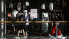 Shoppers walk through a mall in Tampa, Florida. Photographer: Eve Edelheit/Bloomberg
