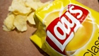 A bag of PepsiCo Frito-Lay brand Lays potato chips are displayed for an arranged photograph taken in Tiskilwa, Illinois, U.S., on Wednesday, April 17, 2019. PepsiCo is getting a boost from some of its classic brands. The snack and beverage giant posted quarterly results that beat estimates, sending shares to the highest since at least 1980.