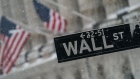 A Wall Street street sign outside the New York Stock Exchange (NYSE)