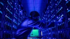 An engineer inspects mining rigs mine the Ethereum and Zilliqa cryptocurrencies at the Evobits crypto farm in Cluj-Napoca, Romania, on Wednesday, Jan. 22, 2021. The world’s second-most-valuable cryptocurrency, Ethereum, rallied 75% this year, outpacing its larger rival Bitcoin. Photographer: Akos Stiller/Bloomberg