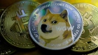 KATWIJK, NETHERLANDS - JANUARY 29: In this photo illustration, visual representations of digital cryptocurrencies, Dogecoin and Bitcoin are arranged on January 29, 2021 in Katwijk, Netherlands. (Photo by Yuriko Nakao/Getty Images)