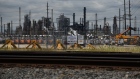 The Motiva Enterprises LLC Refinery stands in Port Arthur, Texas, U.S., on Monday, Aug. 24, 2020. Oil and chemical facilities located along the Texas Gulf Coast are shuttering, securing equipment or running through emergency protocols ahead of a strong hurricane set to rip through the region this week.