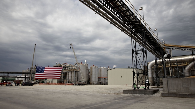 An American flag hangs on display at the Southwest Iowa Renewable Energy ethanol facility in Council Bluffs, Iowa, U.S., on Tuesday, June 11, 2019. Iowa will get a preview of a potential 2020 showdown on Tuesday when both Trump and Biden hold events in different parts of the state, which is already being blanketed by Democratic presidential candidates. Photographer: Daniel Acker/Bloomberg