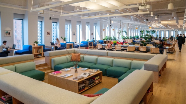 Seating areas are seen as members work at the WeWork Cos Inc. 85 Broad Street offices in the Manhattan borough of New York.