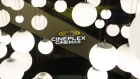 Signage is displayed inside a Cineplex Cinemas movie theater in Toronto, Ontario, Canada on Monday, Feb. 3, 2020. Britain's Cineworld Group Plc is on track to become North America's biggest operator of movie theaters with its plan to buy Canada's Cineplex Inc. for C$2.15 billion ($1.64 billion). Photographer: Cole Burston/Bloomberg