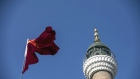 A Chinese flag flies in front of a mosque in Urumqi, capital of the northwestern province of Xinjiang.