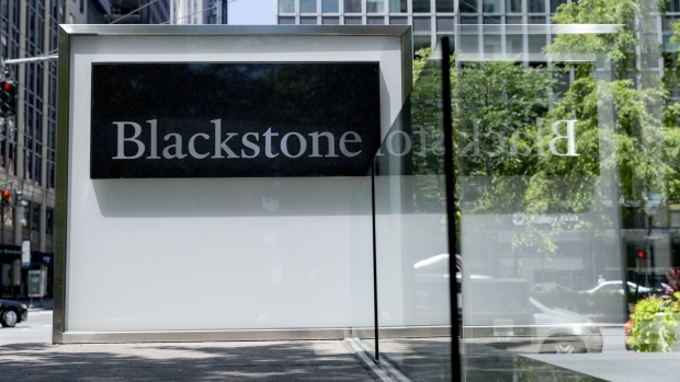 Signage is displayed outside the Blackstone Group Inc. headquarters in New York, U.S.