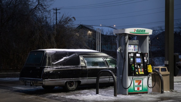 A hearse parked at a gas station in Austin, Texas, U.S., on Wednesday, Feb. 17, 2021. The crisis that has knocked out power for days to millions of homes and businesses in Texas and across the central U.S. is getting worse, with blackouts expected to last until at least Thursday.