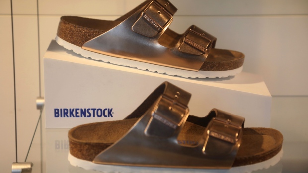 Sandals in the window display of a Birkenstock GmbH footwear store in Berlin, Germany, on Tuesday, Jan. 19, 2021. Birkenstock, the German company behind the iconic sandals worn by hippies and preppies alike, is in talks to be taken over by CVC Capital Partners, according to people familiar with the matter.