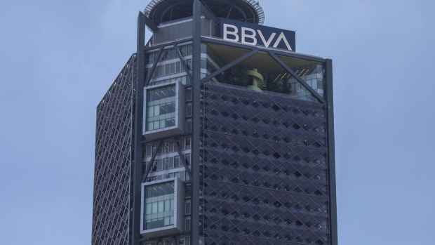 Signage is displayed on the top of Banco Bilbao Vizcaya Argentaria SA (BBVA) Tower in Mexico City, Mexico, on Thursday, June 27, 2019. BBVA committed to invest about $3 billion in Mexico during President Andres Manuel Lopez Obrador's tenure, according to a tweet posted by the President.