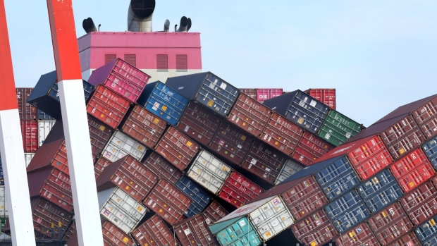 Dislodged containers on the One Apus container ship, berthed at the Kobe Port in Hyogo, Japan, on Thursday, Dec. 10, 2020. The vessel, managed by NYK Shipmanagement Pte, suffered a massive stack collapse and lost 1,816 containers - 64 of which are classified as dangerous goods - at sea due to severe weather on Nov. 30 while it was en route from Yantian, China to Long Beach, U.S. Photographer: Buddhika Weerasinghe/Bloomberg