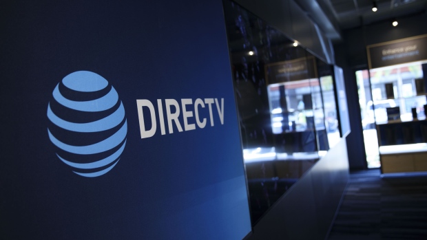 AT&T Inc. and DirecTV signage is displayed at a company store in Newport Beach, California, U.S., on Thursday, Aug. 10, 2017. Photographer: Patrick T. Fallon/Bloomberg