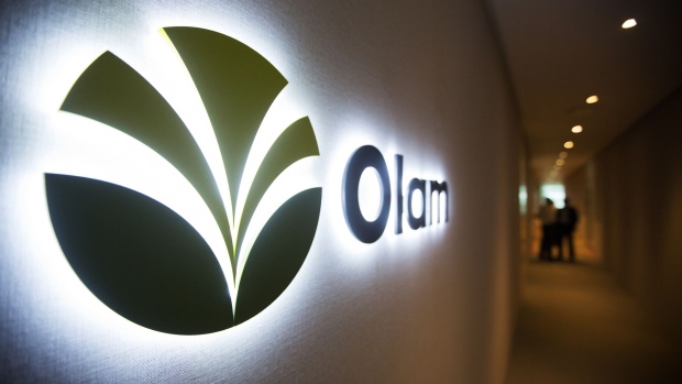The Olam International Ltd. logo is displayed at the company's office in Singapore, on Monday, Aug. 14, 2017. Olam predicts cocoa market conditions will stabilize this half after volatile prices hit earnings for another quarter. Photographer: Nicky Loh/Bloomberg