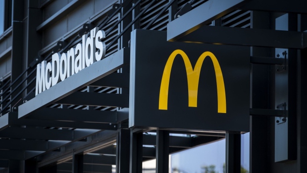Signage is displayed outside a McDonald's Corp. restaurant in Chicago, Illinois, U.S., on Monday, July 22, 2019. McDonald's is scheduled to release earnings figures on July 26. Photographer: Christopher Dilts/Bloomberg