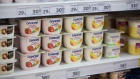 Tubs of yoghurt, produced by Danone SA, sit on display inside a Magnit PJSC hypermarket store in Moscow, Russia, on Wednesday, Feb. 28, 2018. Billionaire Sergey Galitskiy will quit as chief executive officer of Magnit PJSC after selling 138 billion rubles ($2.5 billion) of shares--29 percent of the company--to the state-controlled VTB Group, Magnit said in a regulatory filing. Photographer: Andrey Rudakov/Bloomberg