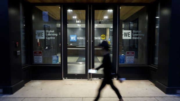 Signage is displayed inside a WE Charity office in Toronto, Ontario, Canada, on Wednesday, Sept. 9, 2020. WE Charity says it is closing its Canadian operations, blaming Covid-19 and the political fallout from the Liberal government's plan to have it run a multimillion-dollar student-volunteer program, Canadian Press reports. Photographer: Cole Burston/Bloomberg