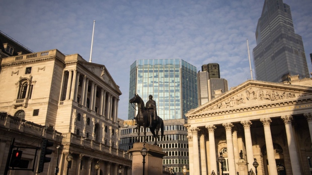 The Bank of England, left, and the Royal Exchange in the City of London, U.K., on Monday, March 8, 2021. Values in the U.K. capital should jump about 25% over the next five years, outpacing other European capitals, according to DWS researchers. Photographer: Jason Alden/Bloomberg