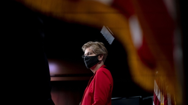 Senator Elizabeth Warren, a Democrat from Massachusetts, listens during a news conference at the U.S. Capitol in Washington, D.C., U.S., on Monday, March 1, 2021. Warren said her proposed wealth tax on households worth more than $50 million could help pay for investments in infrastructure, childcare and health reforms as part of President Joe Biden’s plan to "Build Back Better" after the coronavirus pandemic that has disproportionately hit low-income families.