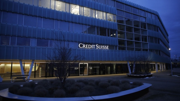 A Credit Suisse Group AG office building as night falls in Muri, Bern, Switzerland, on Monday, Feb. 15, 2021. Credit Suisse is expecting to post a fourth-quarter loss when it reports earnings on Feb. 18, after setting aside $850 million for U.S. legal cases including MBIA and booking a $450 million impairment on a hedge fund investment. Photographer: Stefan Wermuth/Bloomberg