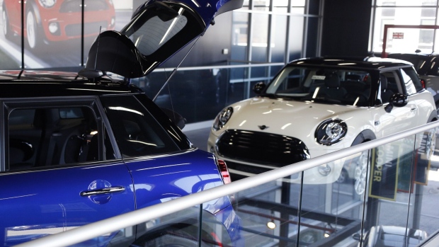 BMW MINI Cooper vehicles are displayed for sale at a dealership in Louisville, Kentucky.