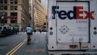 A FedEx Corp. delivery truck sits parked in the Financial District of New York, U.S., on Monday, June 18, 2018. FedEx Corp. is scheduled to release earnings figures on June 19. Photographer: Christopher Lee/Bloomberg