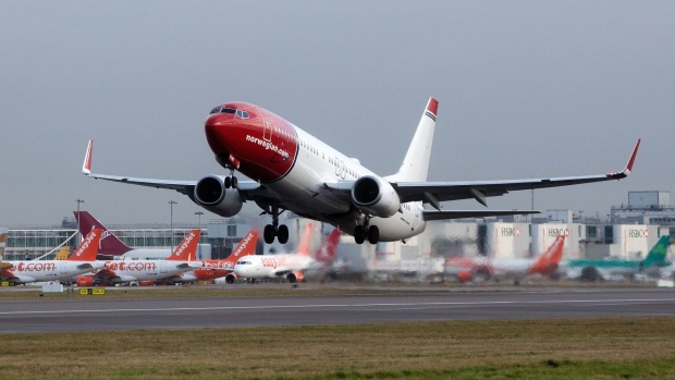 A Boeing Co. 737 passenger aircraft, operated by Norwegian Air Shuttle ASA, takes off at London Gatwick Airport in Crawley, U.K., on Tuesday, Jan. 10, 2017. Norwegian attracted 29.3 million passengers last year, a 14 percent increase that's likely to put it ahead of SAS AB's Scandinavian Airlines for the first time.