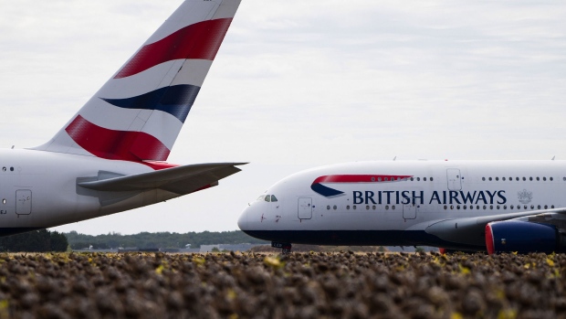 A grounded Airbus SE A380 passenger jet operated by British Airways .