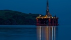 The Paul B. Loyd Jr drilling rig, operated by Transocean Inc., stands illuminated at night in the Port of Cromarty Firth in Cromarty, U.K., on Tuesday, June 23, 2020. Oil headed for a weekly decline -- only the second since April -- as a surge in U.S. coronavirus cases clouded the demand outlook, though the pessimism was tempered by huge cuts to Russia's seaborne crude exports.