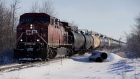 A Canadian Pacific Railway Ltd. train transporting oil leaves Hardisty, Alberta, Canada, on Saturday, Dec. 7, 2013. Canadian heavy crude reached its strongest level in more than two months on the spot market as a pipeline connection to the U.S. Gulf Coast began filling with crude ahead of its startup next month.