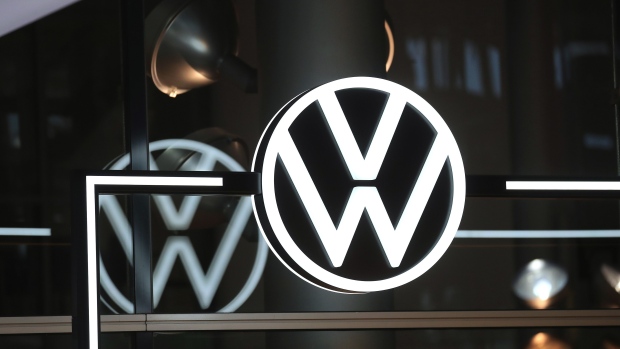 A Volkswagen AG (VW) logo sits on display as a VW ID.3 electric automobile, the first of around 22 million vehicles to be produced and delivered worldwide by 2028, is handed over to a customer at automaker's factory in Dresden, Germany, on Friday, Sept. 11, 2020.