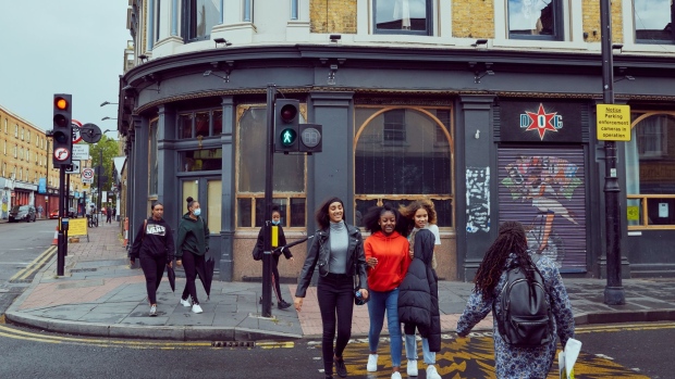 Pedestrians cross the junction of Coldharbour Lane and Atlantic Road in the Brixton district of London, U.K., on Wednesday, July 1, 2020. Brixton is iconic in the history of Black struggle following a wave of postwar immigration.