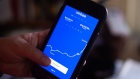 The Coinbase application on a smartphone arranged in Hastings-on-Hudson, New York, U.S., on Monday, Jan. 4, 2021. Coinbase Inc. knew cryptocurrency XRP was a security rather than a commodity and "illegally" sold Ripple Labs Inc.'s tokens anyway, a customer argues in a proposed class-action lawsuit over the commissions the crypto exchange collected. Photographer: Tiffany Hagler-Geard/Bloomberg
