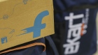 The logo of Flipkart Online Services Pvt is seen on the side of a package at the company's office in the Jayaprakash Narayan Nagar area of Bengaluru, India, on Wednesday, Oct. 26, 2016. Flipkart, India's largest and most valuable e-commerce company, is against domestic rival Snapdeal.com and U.S. leviathan Amazon.com Inc., all tussling for dominance in a market that Morgan Stanley expects to explode more than ten-fold to $137 billion by 2020 from $11 billion in 2013. Photographer: DHIRAJ SINGH/Bloomberg
