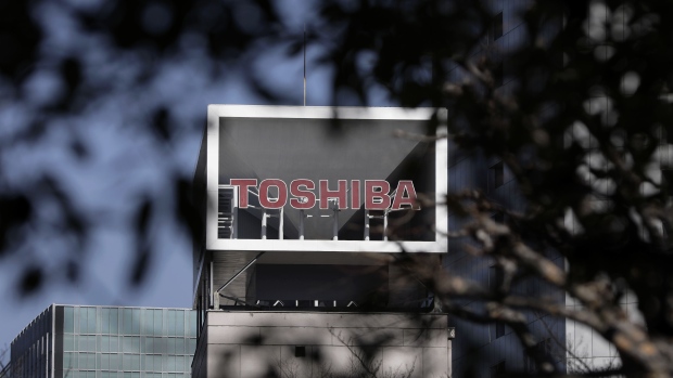 Signage for Toshiba Corp. is displayed at the company's headquarters in Tokyo, Japan, on Wednesday, Feb. 14, 2018.