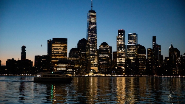 One World Trade Center and the lower Manhattan skyline along the waterfront in Jersey City, New Jersey, U.S., on Monday, April 5, 2021. U.S. futures edged higher while most Asian stocks climbed as investors digested Friday’s unexpectedly strong jobs report.