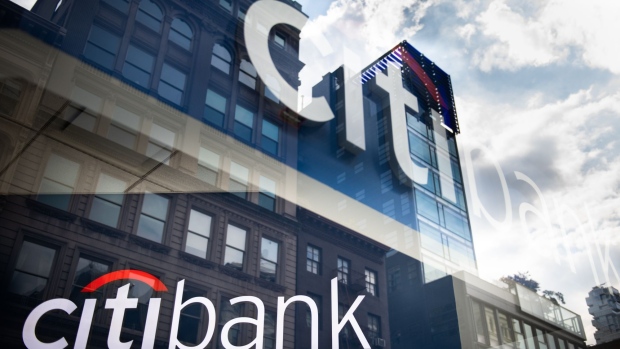 Signage is displayed in the window of a Citigroup Inc. bank branch in New York, U.S., on Wednesday, July 3, 2019. Citigroup Inc. is scheduled to release earnings figures on July 15. Photographer: Mark Kauzlarich/Bloomberg
