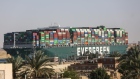 The Ever Given container ship moves along the Suez Canal towards Ismailia after being freed from the canal bank in Suez, Egypt, on Monday, March 29, 2021. The giant Ever Given container ship was finally pulled free from the bank of the Suez Canal, allowing for a massive tail back of ships to start navigating once again through one of the world’s most important trade routes. Photographer: Islam Safwat/Bloomberg