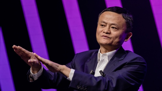 Jack Ma, chairman of Alibaba Group Holding Ltd., left, gestures while speaking during a fireside interview at the Viva Technology conference in Paris, France, on Thursday, May 16, 2019. Donald Trump’s latest offensive against China’s Huawei Technologies Co. puts Europe in an even bigger bind over which side to pick, but France's President Emmanuel Macron is holding the line.