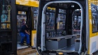 An employee secures carriage fittings on the Bombardier Flexity tram assembly line at the Bombardier Inc. factory in Hennigsdorf, Germany, on Wednesday, Nov. 18, 2020. Bombardier announced a deal earlier this year to divest its train unit to Alstom SA for $8.4 billion. Photographer: Krisztian Bocsi/Bloomberg