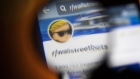 The Reddit forum WallStreetBets on a smartphone seen through a magnifying glass arranged in Sydney, Australia, on Thursday, Jan. 28, 2021. WallStreetBets, the internet forum fueling a frenzy of retail trading, briefly turned itself off to new users Wednesday after a deluge of new participants raised concerns about its ability to police content, a notice on the website said. Photographer: Brent Lewin/Bloomberg