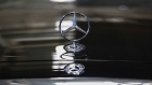 A trident hood ornament sits on the hood of a Mercedes S500 luxury combustion engine sedan sits on display following unveiling at the Mercedes-Benz AG Factory 56, operated by Daimler AG, in Sindelfingen, Germany, on Wednesday, Sept. 2, 2020. The latest iteration of the Mercedes S-Class, which the German carmaker presents on Wednesday, will try to please tastes old and new -- offering not just the high-powered combustion variant but also an improved hybrid version and, for the first time, a sleek all-electric sibling sold from next year. Photographer: Michaela Handrek-Rehle/Bloomberg