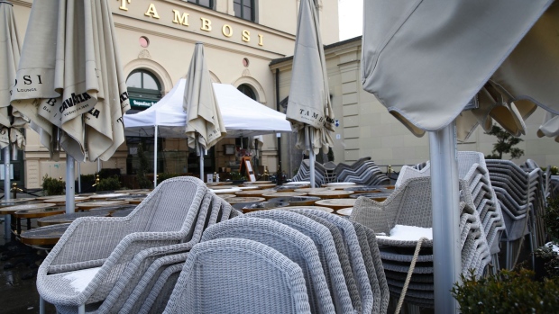 Stacked furniture on a closed restaurant terrace in Munich, Germany, on Wednesday, April 7, 2021. Bavaria's Premier Markus Soeder -- a contender to become the CDU-led bloc’s chancellor candidate in September elections -- said on Wednesday that he doesn’t see a majority of state leaders backing the proposal for a hard nationwide lockdown.
