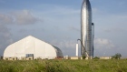 A prototype of the Space Exploration Technologies Corp. (SpaceX) Starship launch vehicle stands at the SpaceX launch facility in Cameron County, Texas, U.S., on Saturday, Sept. 28, 2019. Elon Musk gave space fans an update Saturday evening on the status of "Starship," the next-generation vehicle his SpaceX plans to use to eventually take humans to Mars.