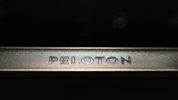 A Peloton Interactive Inc. treadmill sits on display at the company's showroom on Madison Avenue in New York, U.S., on Wednesday, Dec. 18, 2019. The stakes are high for Peloton as it heads into its first holiday season as a publicly traded company. Peloton projected sales of $410 million to $420 million for the quarter ending Dec. 31, up about 60% from the same quarter a year earlier. Photographer: Jeenah Moon/Bloomberg