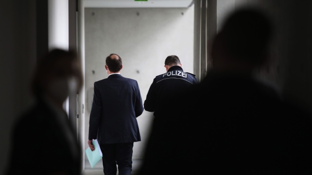 Stephan Freiherr von Erffa, former head of accounting at Wirecard AG, center, departs after giving testimony at the inquiry into the collapse of Wirecard ,at the German Bundestag’s Paul-Loebe-Haus in Berlin, Germany, on Thursday, March 18, 2021. Wirecard collapsed last June, becoming Germany’s biggest corporate scandal in recent memory.