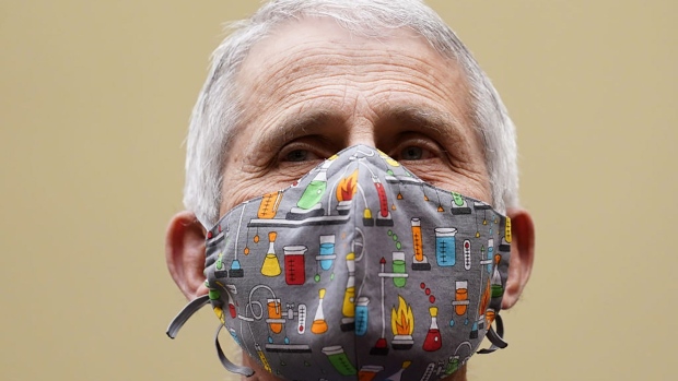 Anthony Fauci, director of the National Institute of Allergy and Infectious Diseases, wears a protective mask during a Select Subcommittee On Coronavirus Crisis hearing in Washington, D.C., U.S., on Thursday, April 15, 2021. Top U.S. health officials, set to testify Thursday at a House hearing, are likely to face questions about the governments decision to pause use of Johnson & Johnsons Covid-19 vaccine after a small number of recipients developed severe blood clots. Photographer: Bloomberg/Bloomberg